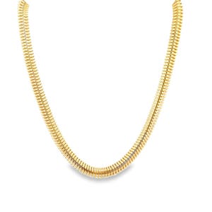 May include: A gold-colored chain necklace with a snake-like design. The necklace is made of small, rectangular links that are closely connected, creating a smooth, flexible appearance. The chain is displayed against a white background.