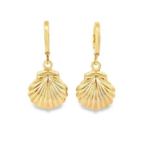 May include: A pair of gold-colored seashell earrings. Each earring features a detailed, textured seashell pendant suspended from a hinged hoop. The earrings are designed to be worn and add a touch of coastal charm.