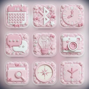 May include: Nine pink and white decorative icons, including a calendar, Bluetooth symbol, clock, speech bubbles, lightbulb, camera, file folder, compass, and square clock. Each icon is surrounded by frosting and decorative elements.
