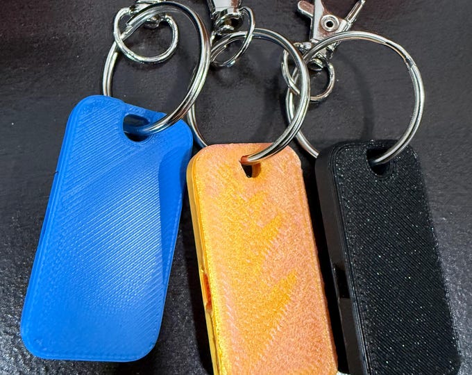 High-Decibel Whistle Keychain – Compact & Powerful for Outdoor Use!