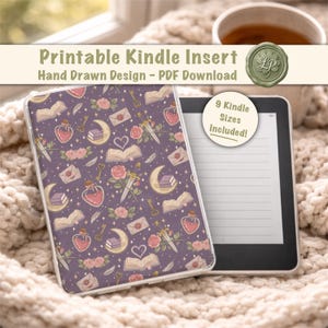 May include: A Kindle cover with a purple background and a repeating pattern of books, keys, roses, moons, and potion bottles. The text "Printable Kindle Insert" and "Hand Drawn Design - PDF Download" are visible. A sticker says "9 Kindle Sizes Included!"