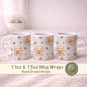 May include: Three white ceramic mugs with a repeating pattern of a bunny holding a strawberry and scattered strawberries on a light blue background. The mugs have the text "11oz & 15oz Mug Wraps Hand Drawn Design."