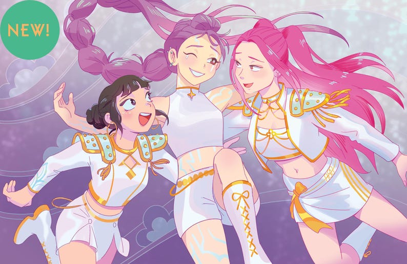 May include: Illustration of three young women in white and gold outfits, with pink and purple hair, smiling and laughing. The image has a light purple and white background with a green circle that says "NEW!"