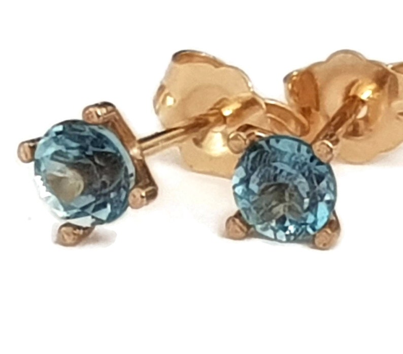 14k Gold London Blue Topaz Earrings image 1