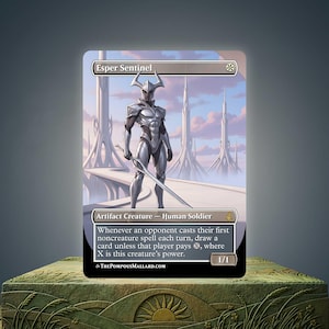 May include: A fantasy art card featuring an armored figure labeled "Esper Sentinel" holding a sword. The card has a silver and white color scheme with text at the bottom describing the card's abilities. The background shows a futuristic city.