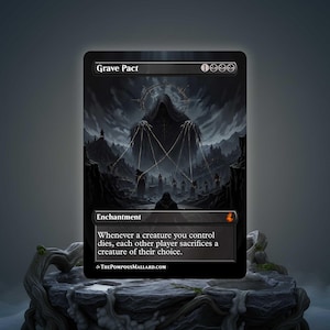May include: A black and gray Grave Pact card featuring a hooded figure with a dark, ominous background. The card text reads "Enchantment" and describes the card's effect. The card is displayed on a stone-like surface.