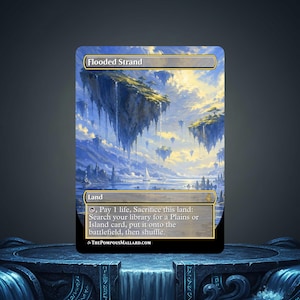 May include: A Magic: The Gathering card titled "Flooded Strand" featuring a fantasy landscape with floating islands, waterfalls, and a sailboat on the water. The card has a gold border and includes game text.
