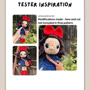May include: A crochet doll with dark brown curly hair, a large red bow, a blue dress, red boots, and a tan crossbody bag. The text reads TESTER INSPIRATION, @heykatkrochet, and Modifications made - bow and cat not included in final pattern.