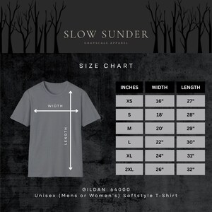 May include: A grey t-shirt with a size chart, displaying measurements in inches for sizes XS to 2XL. The shirt's width ranges from 40.6 cm to 66 cm, and the length varies from 68.6 cm to 81.3 cm. The text "SLOW SUNDER" and "GRAYSCALE APPAREL" are at the top.