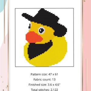 May include: A digital cross-stitch pattern of a yellow rubber duck wearing a black cowboy hat and beard, with the text "RubberDuck" at the top. The pattern size is 47 x 61, with a finished size of 9.1 x 11.7 cm. The text "Digital Pattern" is at the bottom.