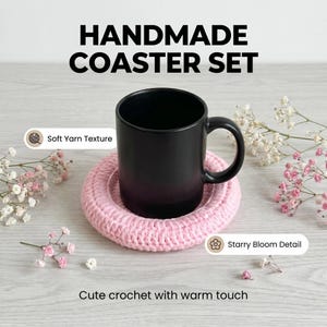 May include: A round, light pink crocheted coaster with a soft yarn texture and a starry bloom detail, supporting a solid matte black ceramic mug. The image includes the text HANDMADE COASTER SET, Soft Yarn Texture, Starry Bloom Detail, and Cute crochet with warm touch.