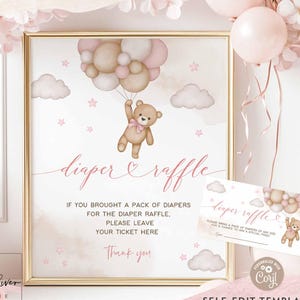 May include: A framed baby shower sign with a teddy bear holding balloons. The sign reads "diaper raffle" and includes text about bringing diapers. The color scheme is soft pink and beige, with a matching card.