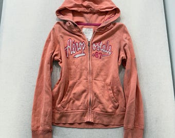 Chaqueta con capucha y cremallera completa en color rosa salmón de Aeropostale con logotipo aplicado, talla M