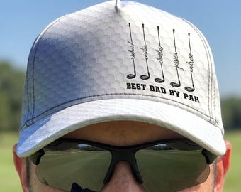May include: A white baseball cap with a gray honeycomb pattern. The front features five black golf club illustrations, each labeled with the names Richard, Emilia, Charles, Jessica, and Andrew. Below the clubs, the text reads BEST DAD BY PAR.