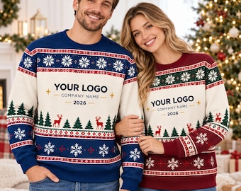 May include: Two long-sleeve crewneck sweaters featuring a cream-colored center panel with the text YOUR LOGO, COMPANY NAME, and 2026. The sweaters have blue and maroon sleeves and borders decorated with white snowflakes, green pine trees, and red deer.