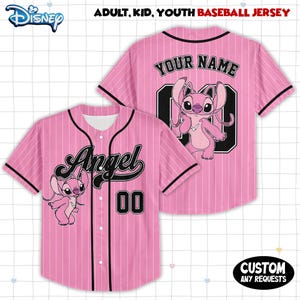 May include: Pink baseball jersey with black pinstripes, featuring the word "Angel" and the number "00". The jersey has a cartoon character on the front and back. The text "YOUR NAME" is on the back.