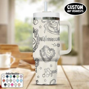 May include: A white tumbler with a handle, straw, and lid. The tumbler features a pattern of gray decorative elements and the text "Name". The top right corner has a black oval with the text "CUSTOM ANY REQUESTS". A color chart is in the bottom left.