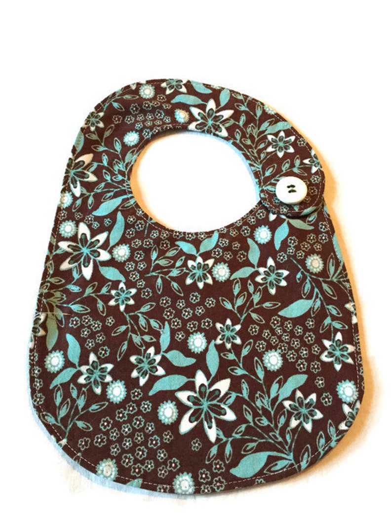 Brown teal floral print bib image 1