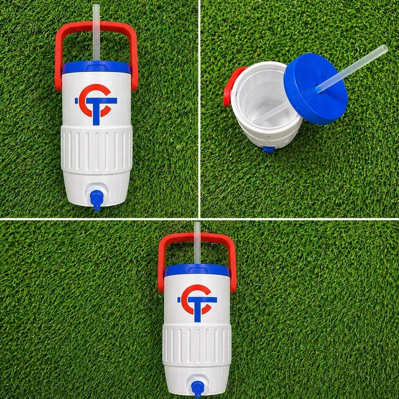 May include: White and blue insulated water cooler with a red handle and a blue lid. The cooler has a spout and a straw. The cooler has a logo in blue. The cooler is designed to keep drinks cold.