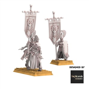 May include: Two white miniature figures of fantasy warriors, one mounted on a horse, holding banners with a crest design. The figures stand on a tan base. The words "DESIGNED BY" and a logo are in the lower right corner.