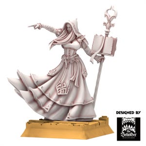 May include: A detailed, off-white miniature of a robed figure with a hood, pointing with one hand and holding a staff and book. The figure is standing on a rectangular base. The design is by The Beholder Miniatures.