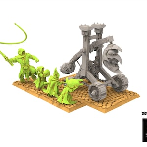 May include: A miniature fantasy scene featuring a lime green figure with a whip leading a line of hooded figures towards a gray trebuchet with a skull-shaped projectile. The figures stand on a textured, tan base.