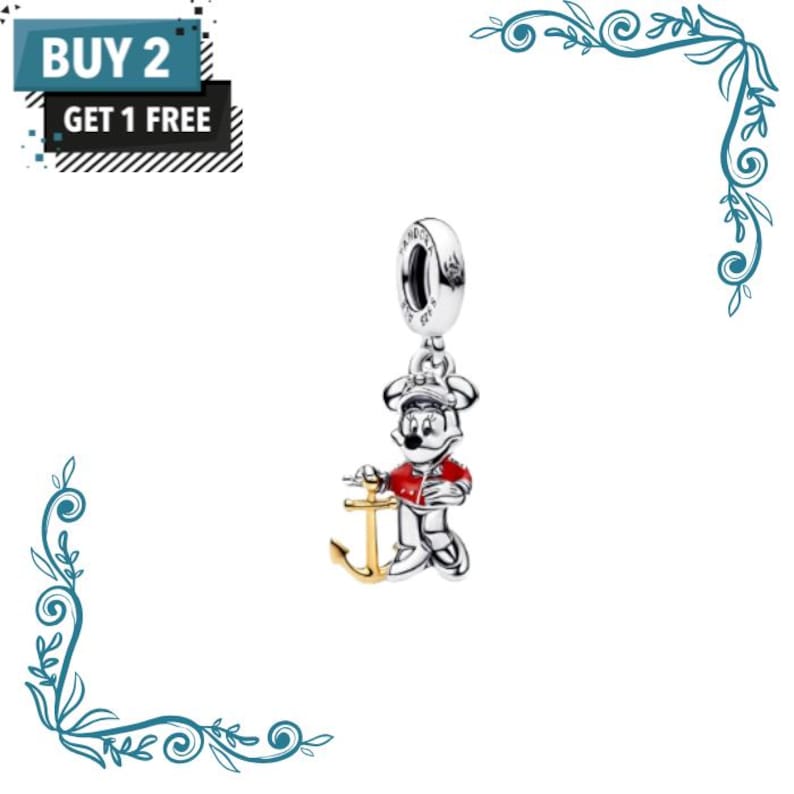 May include: A silver charm featuring a cartoon mouse character wearing a red jacket and a cap, holding a gold-coloured anchor. The charm includes a circular bail with engraved text. The image also displays a black and blue graphic with the text BUY 2 GET 1 FREE.