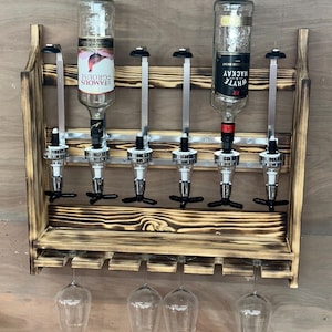 Wall mounted optics bar