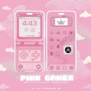 May include: A pink and white phone screen with a pink game console design. The screen displays the time 4:43 and the text "THE GAME IS IN PROGRESS". The phone screen also has a pink and white game controller design. The text "PINK GANER APP ICONS WIDGETS WALLPAPERS >>> LAZY TARDIGRADE <<<" is at the bottom of the screen.