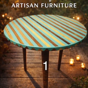 May include: Handcrafted artisan furniture. A round wooden table with a teal, gold, and brown striped top. The table has three dark brown legs. The text "handcrafted ARTISAN FURNITURE" is at the top.