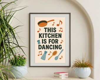 May include: A beige printable wall art print with black text that reads "This kitchen is for dancing". The print features a brown frying pan, a blue salt shaker, and two wooden spoons. There are musical notes scattered around the print.