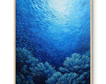 May include: An original oil painting of an underwater scene, featuring a school of fish swimming in a deep blue ocean. The artwork includes coral formations in the foreground and is framed in a natural wood frame.