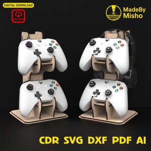 May include: Wooden gaming controller stands with white controllers. The stands are made of light brown wood and hold two controllers each. The image also includes the text "CDR SVG DXF PDF AI" and "DIGITAL DOWNLOAD".
