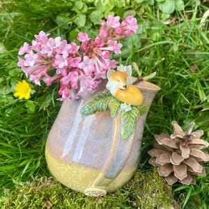 Hand-thrown ceramic mug with a fox on the handle. A unique piece, lovingly handcrafted. This mug is a must-have for every nature lover.