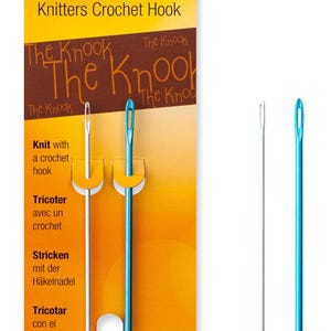 May include: A Pony brand The Knook knitters crochet hook set on a yellow retail card. The set includes one silver 2 mm hook and one blue 3 mm hook, each featuring an eye at the top. The packaging displays the text The Knook and Knit with a crochet hook.
