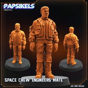 May include: A monochromatic orange miniature figurine of a space crew engineer mate standing on a circular base. The figure wears a multi-pocketed jacket and trousers with visible zippers. The text PAPSIKELS and SPACE CREW ENGINEERS MATE are visible.