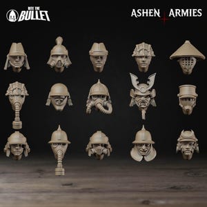 Peut inclure: Une collection de bustes miniatures beiges, chacun représentant un design de casque ou de masque différent. L'assortiment comprend divers styles, tels que des casques de samouraï, des masques à gaz et des casques militaires. L'image est sur fond sombre avec le texte "Bite the Bullet" et "Ashen Armies".