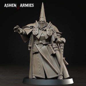 Może przedstawiać: Szara miniaturowa figurka z żywicy z napisem ASHEN ARMIES, przedstawiająca postać w szatach, wysokim spiczastym hełmie i zbroi. Figurka trzyma laskę zwieńczoną czaszką, ma książkę przy pasie i jedną rękę wyciągniętą do przodu.