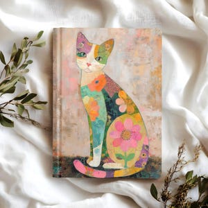 May include: A rectangular hardback journal featuring a colourful illustration of a seated cat. The cat is decorated with various floral patterns in shades of pink, orange, green, and yellow against a textured, light-toned, mottled background.