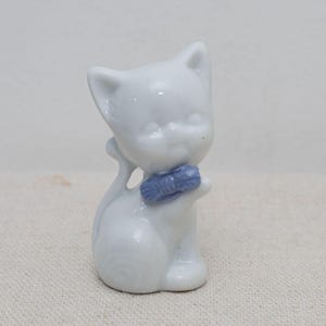 Vintage Porcelain Cat Figurine, Miniature White Cat with Blue Bow, Ceramic Animal Statue, Cute Collectible Gift for Cat Lovers