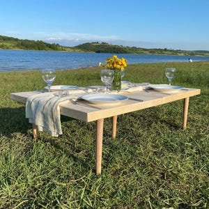 Handmade folding picnic table from natural wood Boho low-seat style for garden, balcony, beach. Portable, durable, and stylish. 22x 44in h13