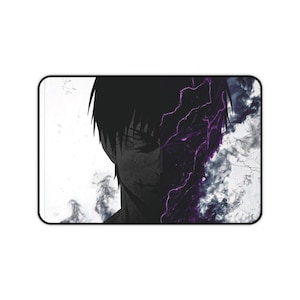 May include: A set of three ceramic mugs with a speckled, matte finish. The mugs are in shades of cream, light gray, and dark gray. Each mug has a simple, minimalist design and a rounded handle. The mugs are stacked on top of each other.