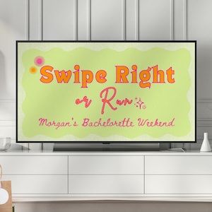 May include: A television screen shows the words "Swipe Right or Run" in orange and pink, with "Morgan's Bachelorette Weekend" underneath. The TV is on a white cabinet, with balloons and party favors in the background.