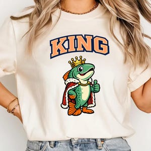 King Salmon Seattle Mariners Baseball T-Shirt – Humpy the Salmon Graphic Tee, Salmon Run Shirt, Seattle Fan Gift, Unisex Graphic Tee