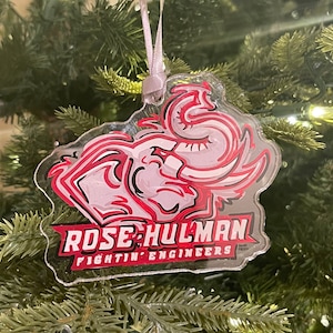 May include: A clear plastic Christmas ornament featuring a red and white elephant with the text "ROSE-HULMAN FIGHTIN' ENGINEERS".