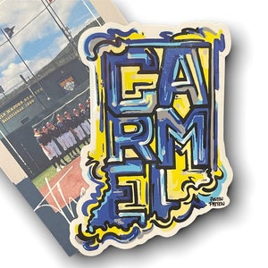 May include: A blue, yellow, and gray sticker with the word "Carmel" written in a stylized font. The sticker is shaped like the state of Indiana. The artist's name, "Justin Patten", is written in the bottom right corner.