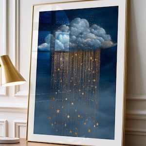 Peut inclure: Impression d'art encadrée représentant une scène de ciel nocturne onirique. Un nuage blanc et duveteux surplombe une pluie dorée en forme d'étoiles. L'œuvre est encadrée dans un cadre doré et est exposée sur une surface en bois.