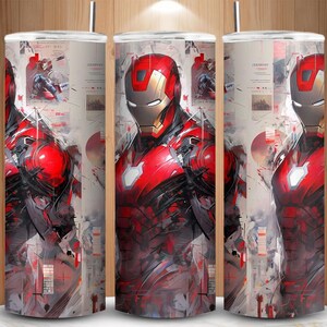 May include: A set of three stainless steel tumblers featuring a vibrant illustration of Iron Man in his iconic red and gold armor. The design incorporates abstract elements and a collage-like background, creating a dynamic and eye-catching aesthetic. The tumblers are cylindrical and appear to be insulated.