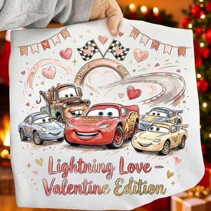 May include: White fabric featuring a watercolor illustration of animated cars, hearts, and racing flags. The design includes the text "Lightning Love - Valentine Edition". The cars are in various colors, including red, blue, and yellow.