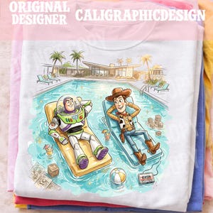 May include: White t-shirt featuring a colorful illustration of Buzz Lightyear and Woody relaxing by a pool. The design includes palm trees, a mid-century modern house, and the text "CALIGRAPHICDESIGN" at the top.
